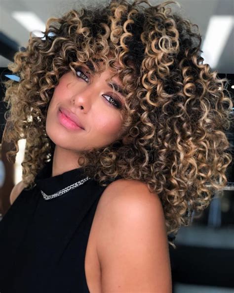 natural curly brown hair with blonde highlights|caramel highlights on curly hair.